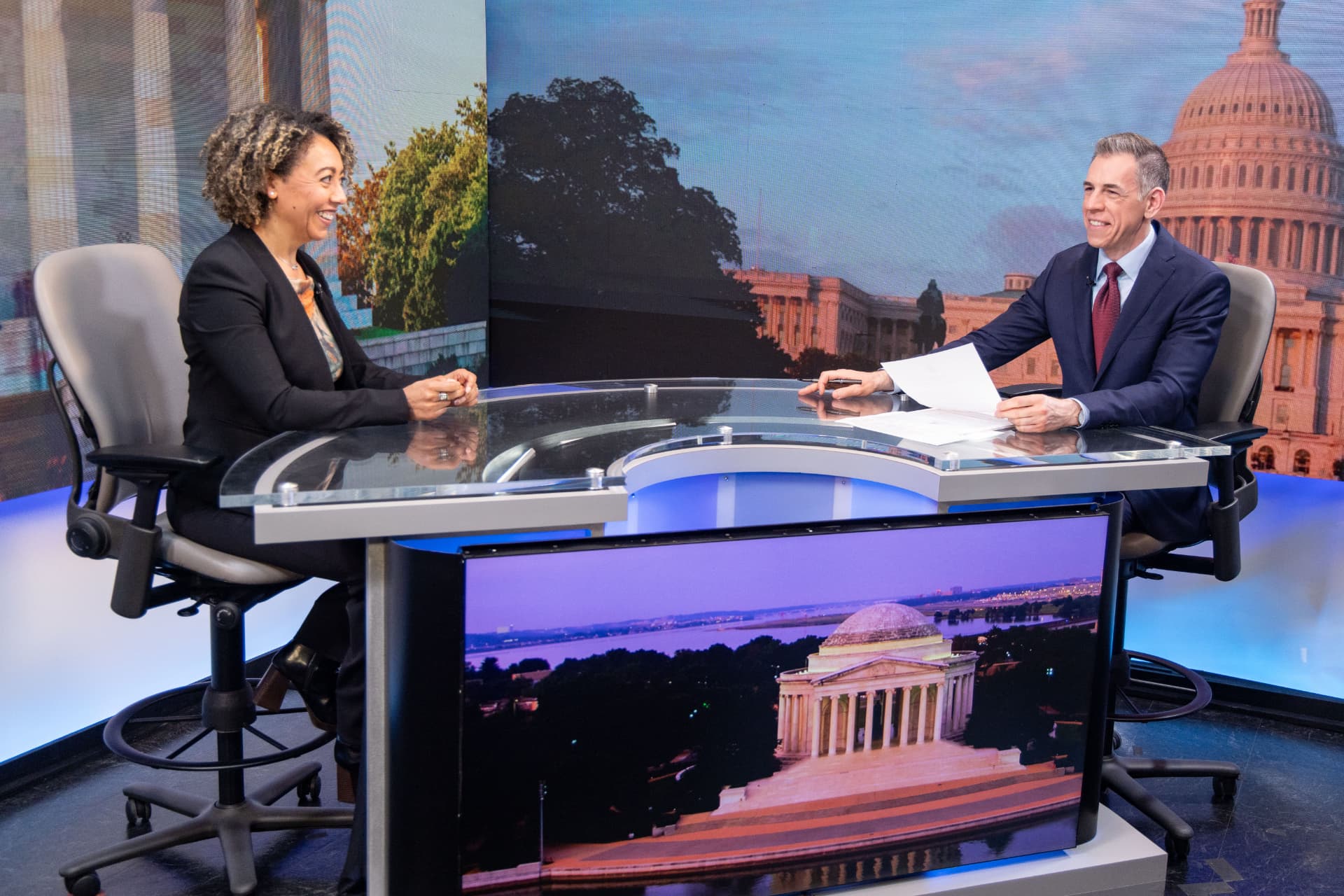 Mark Albert conducting a practice interview with a participant on a Washington television set